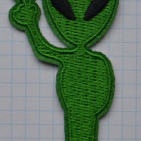 Uzšuve - mazais zaļais cilvēciņš - ciplanētietis simbols MIERS
